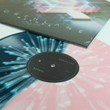 Mesmer 12" Vinyl (Half Pink/Half Translucent Blue with White Splatter)
